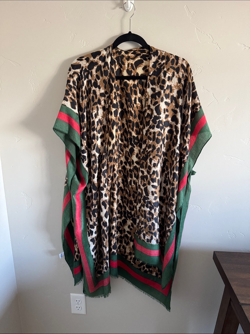 Leopard shawl with open front.  One size
